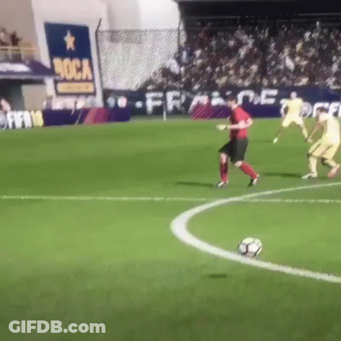 Soccer Players On A Field With A Sign That Says Boca GIF
