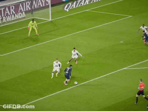 Soccer Players On A Field With An Ad For Qatar Airways In The Background GIF