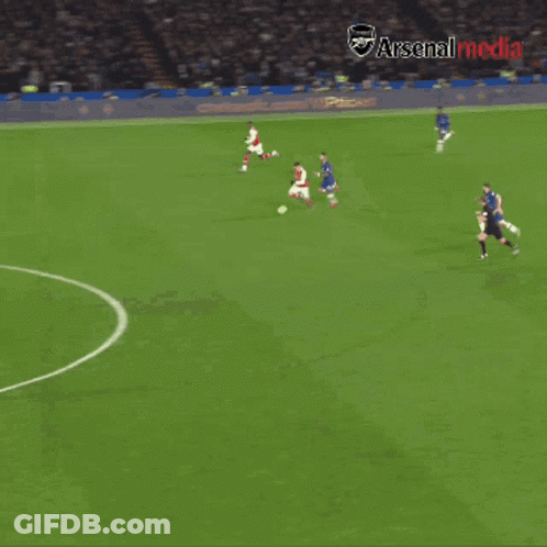 Soccer Players On A Field With Arsenal Media Written On The Bottom Right GIF