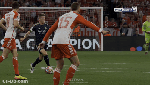 Soccer Players On A Field With The Number 15 On Their Jersey GIF