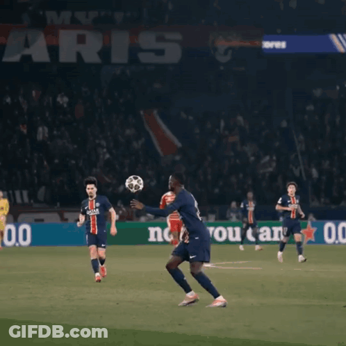 Soccer Players On A Field With The Number 25 In The Background GIF