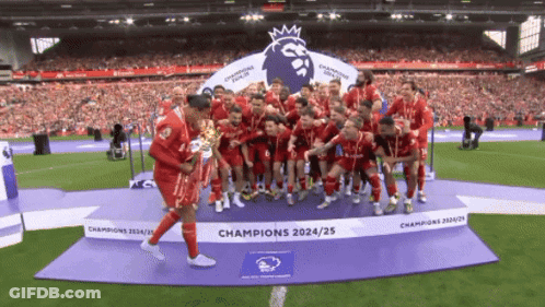 Soccer Players On Champions Podium GIF