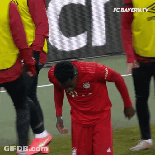 Soccer Players On Field With Allianz Banner GIF