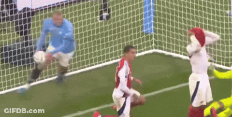 Soccer Players On Field With Blue Jersey GIF