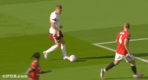 Soccer Players On Field With Built On Legacy Banners GIF
