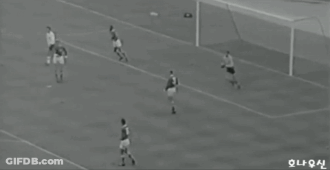 Soccer Players On Field With Chinese Writing GIF
