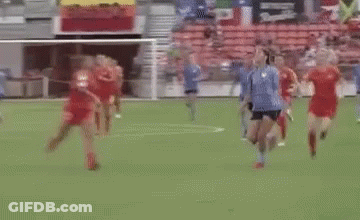 Soccer Players On Field With #Dashtpo Sign GIF