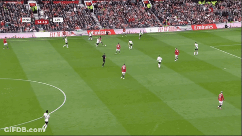 Soccer Players On Field With Dubai Sign GIF