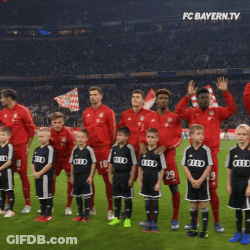Soccer Players On Field With FC Bayern.tv Logo GIF