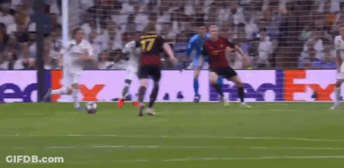 Soccer Players On Field With FedEx Ad GIF