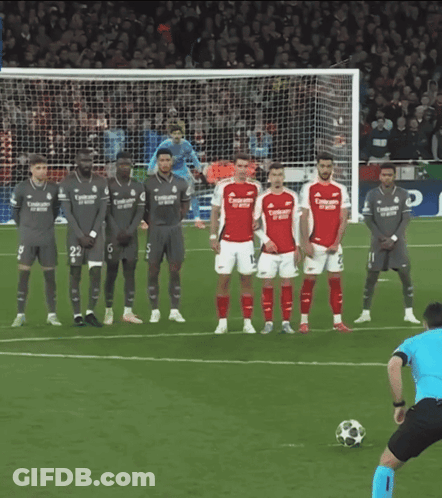 Soccer Players On Field With Fly Emirates Jersey GIF