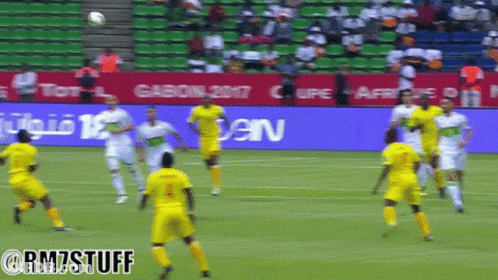Soccer Players On Field With Gasoline Sign GIF