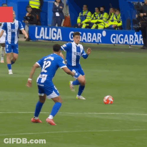 Soccer Players On Field With Gigabar Sign GIF