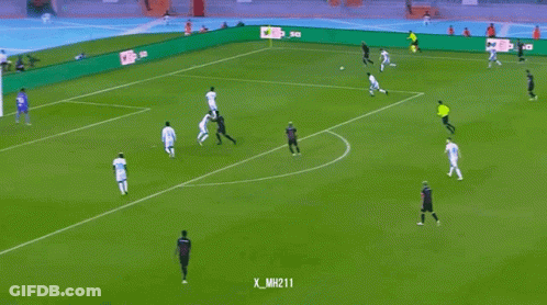 Soccer Players On Field With MH211 Banner GIF