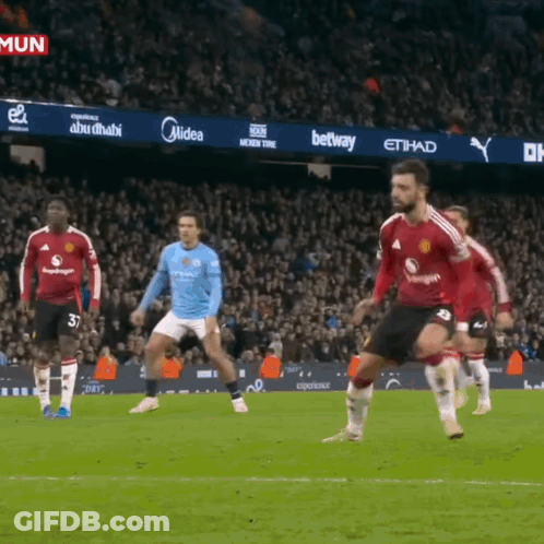 Soccer Players On Field With Midea Betway Ads GIF