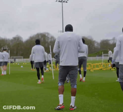 Soccer Players On Field With Nike Shirt GIF