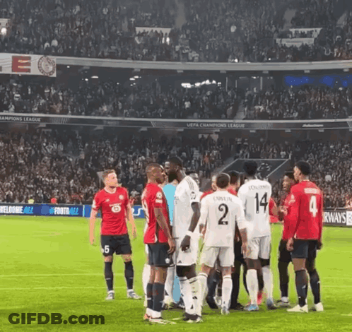 Soccer Players On Field With Number 2 GIF