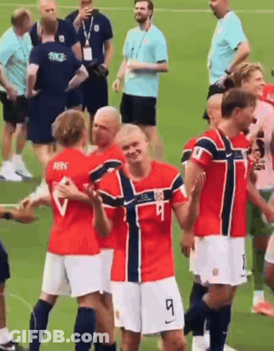 Soccer Players On Field With Number 9 GIF