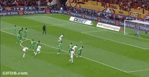 Soccer Players On Field With Orange And XBet Ads GIF