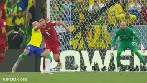 Soccer Players On Field With Power Sign GIF
