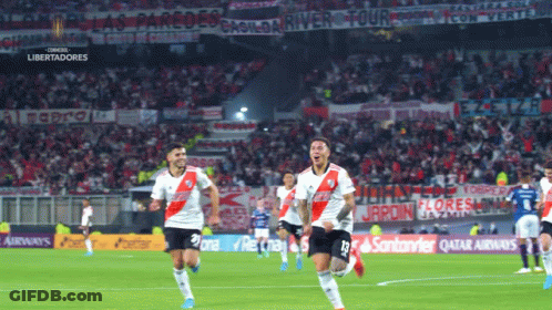 Soccer Players On Field With Qatar Airlines Ad GIF