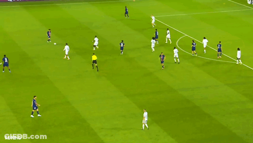 Soccer Players On Field With Qatar Airways Ads GIF