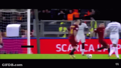 Soccer Players On Field With Scarlca Sign GIF