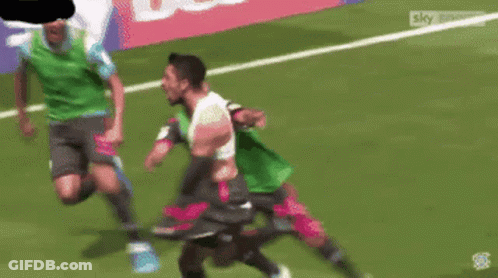 Soccer Players On Field With Sky Sports Logo GIF