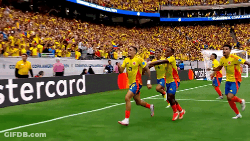 Soccer Players On Field With Stercard Banner GIF
