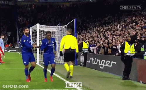 Soccer Players On Field With Stinger Ad GIF