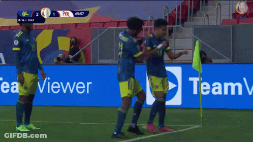 Soccer Players On Field With Tear Sign GIF