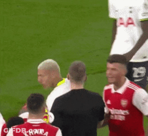 Soccer Players On Field With Xhaka Shirt GIF