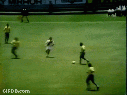 Soccer Players On Field With Yellow PS Sign GIF