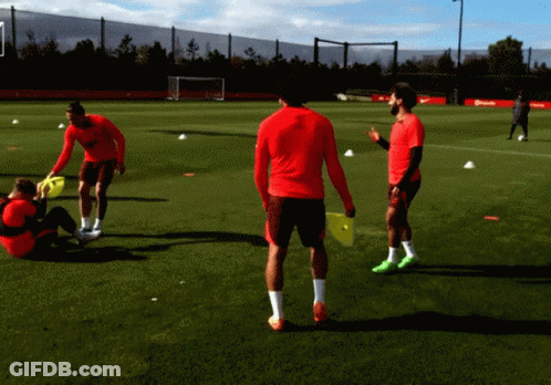 Soccer Players Playing On Field With Pepsi Ad GIF