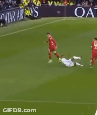 Soccer Players Playing On Field With Qatar Airlines Banner GIF