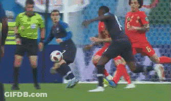 Soccer Players Playing With Referee GIF