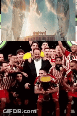 Soccer Players Posing For Photo With Man In Suit GIF
