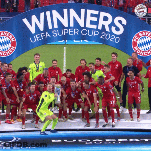 Soccer Players Posing Under Winners UEFA Super Cup 2020 Banner GIF