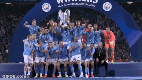 Soccer Players Posing With Champions League Trophy GIF
