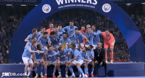 Soccer Players Posing With Champions League Trophy GIF