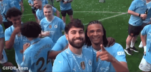 Soccer Players Posing With Number 2 GIF