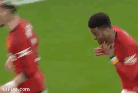 Soccer Players Running On Field With Crowd GIF