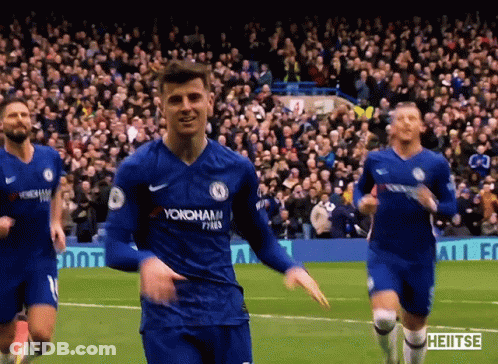 Soccer Players Running On Field With Yokohama Jersey GIF