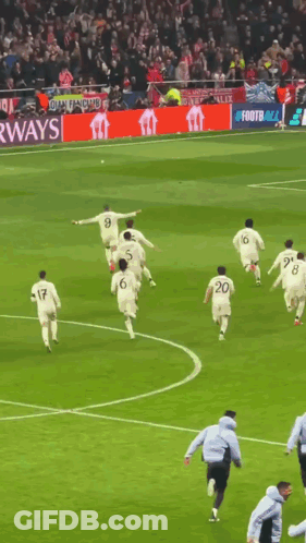 Soccer Players Running With Airways Banner GIF