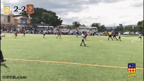 Soccer Players Score 2-2 GIF
