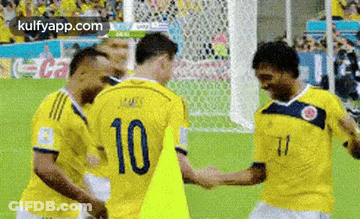 Soccer Players Shaking Hands On Field GIF