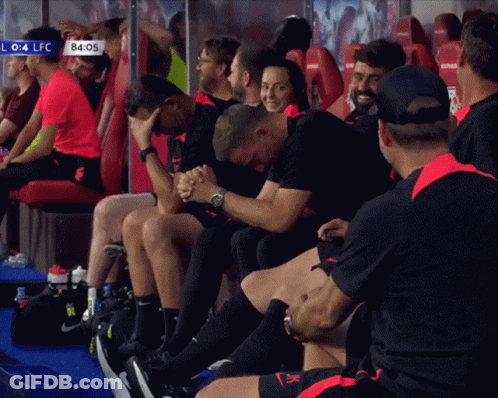 Soccer Players Sitting In Locker Room With 84 05 Sign GIF