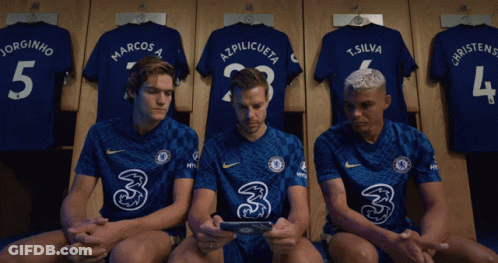 Soccer Players Sitting Locker Room GIF