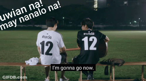 Soccer Players Sitting On Bench GIF
