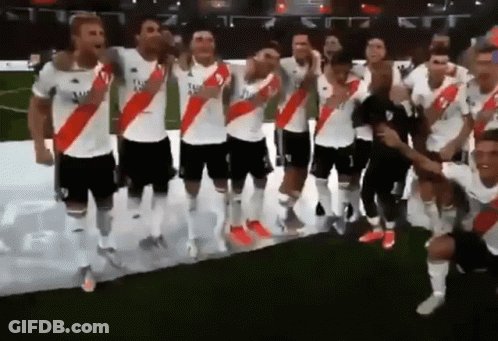 Soccer Players Standing On Field GIF